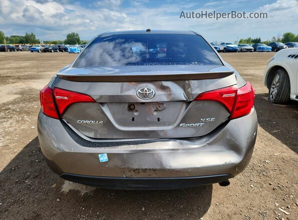 2T1BURHE3JC104362 2018 TOYOTA COROLLA Желто-коричневый Вид сзади