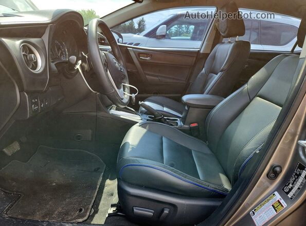 2T1BURHE3JC104362 2018 TOYOTA COROLLA Желто-коричневый Вид салона спереди