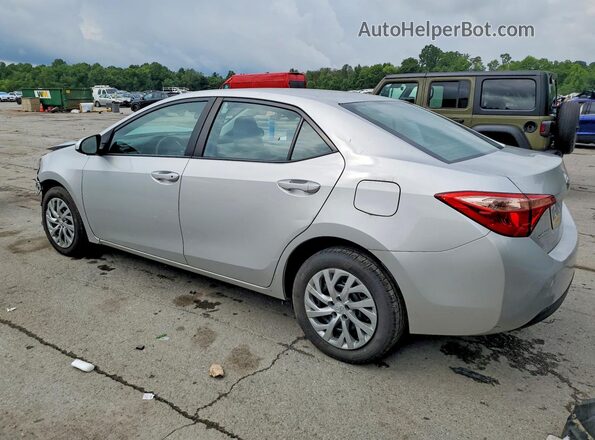 2T1BURHE4HC810699 2017 TOYOTA COROLLA Silver Tył lewy