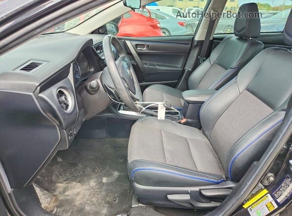 2T1BURHE4JC018252 2018 TOYOTA COROLLA Black Front interior view