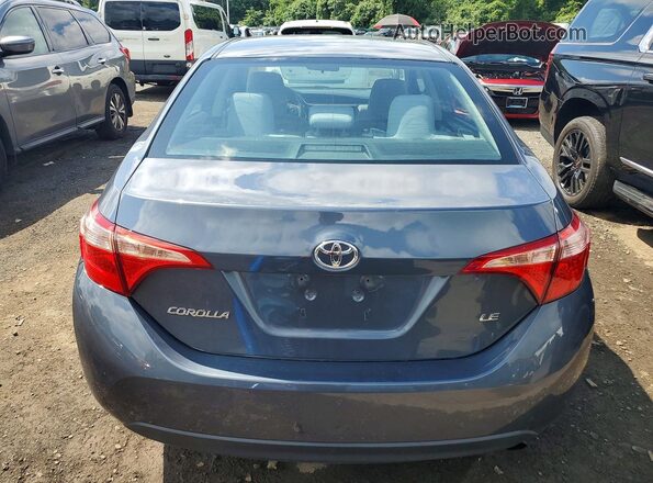2T1BURHE5HC754062 2017 TOYOTA COROLLA Синий Вид сзади
