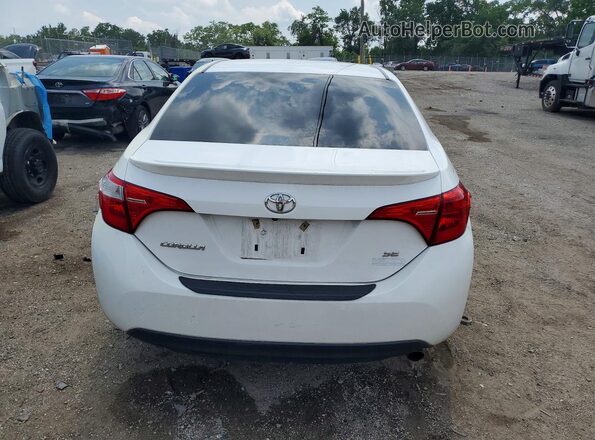 2T1BURHE6JC018754 2018 TOYOTA COROLLA White უკანა ხედი