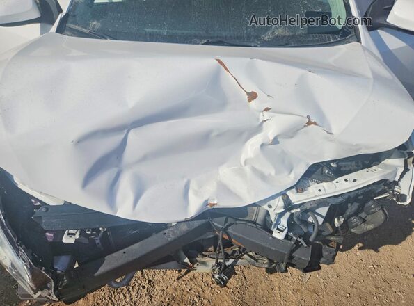 2T1BURHE6JC034288 2018 TOYOTA COROLLA Белый Вид задней части салона