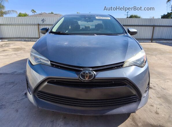 2T1BURHE6JC065721 2018 TOYOTA COROLLA Синий Вид спереди