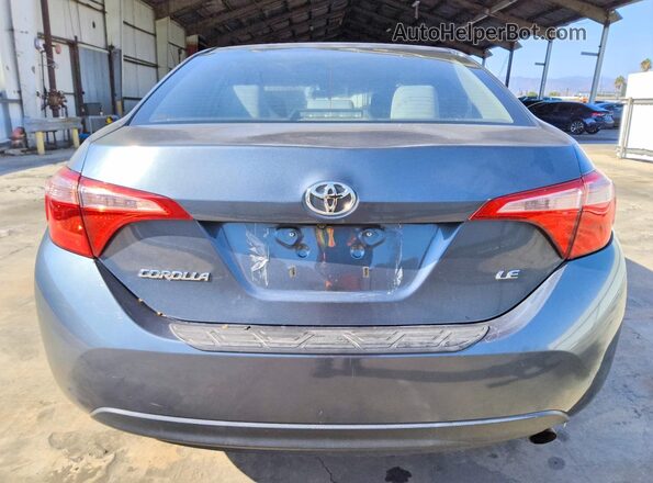 2T1BURHE6JC065721 2018 TOYOTA COROLLA Синий Вид сзади
