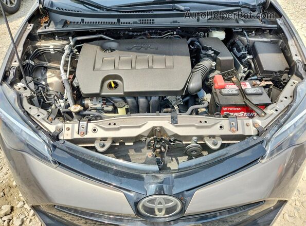 2T1BURHE7HC919318 2017 TOYOTA COROLLA Tan უკანა სალონის ხედი