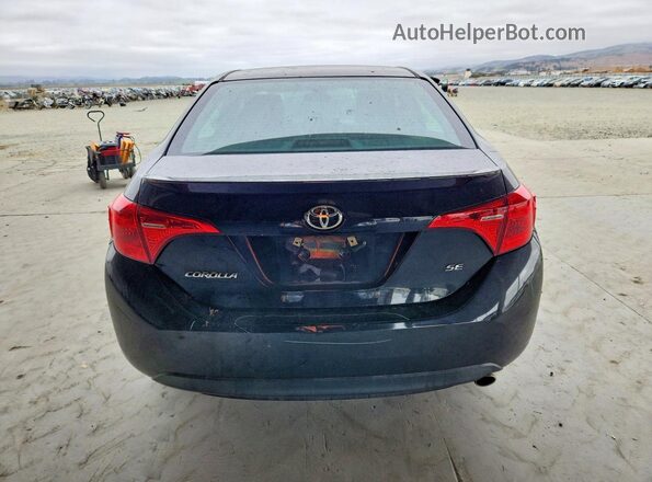 2T1BURHE7HC923191 2017 TOYOTA COROLLA Black Rear view