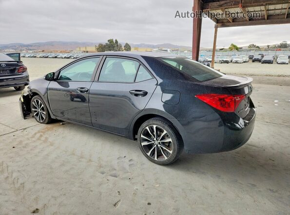 2T1BURHE7HC923191 2017 TOYOTA COROLLA Black Rear left