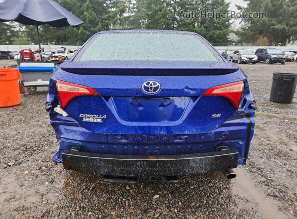 2T1BURHE9HC835453 2017 TOYOTA COROLLA Blue Rear view