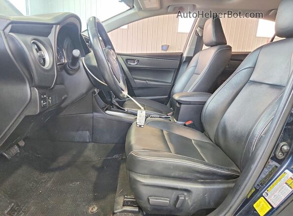 2T1BURHE9JC989022 2018 TOYOTA COROLLA Blue Widok wnętrza z przodu