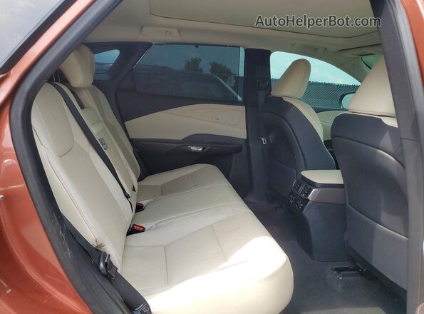 2T2BAMBA3RC023063 2024 LEXUS RX Brown Rear interior view