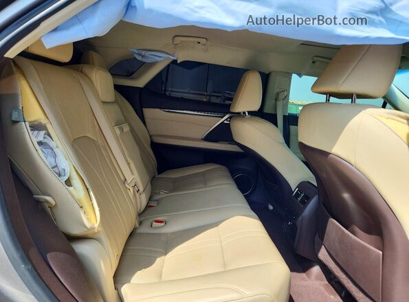 2T2BGMCA5HC009483 2017 LEXUS RX Gray Widok wnętrza z tyłu
