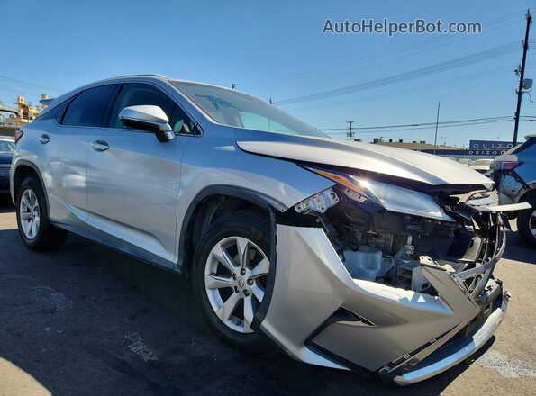 2T2BZMCA9HC054498 2017 LEXUS RX Серебряный Передняя правая четверть