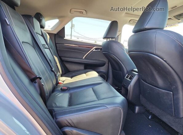 2T2BZMCA9HC054498 2017 LEXUS RX Серебряный Вид задней части салона