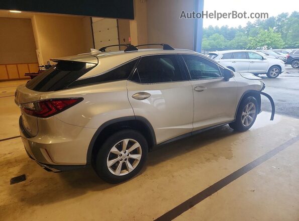2T2BZMCAXHC083038 2017 LEXUS RX Silver Задня права чверть