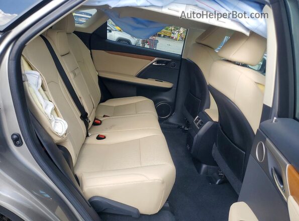 2T2HZMAA7NC253171 2022 LEXUS RX Tan Vista interior trasera