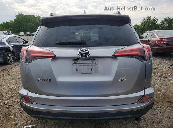 2T3BFREV0GW449734 2016 TOYOTA RAV4 Silver Հետևի տեսք