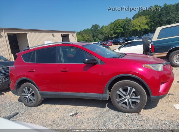2T3BFREV1HW548905 2017 TOYOTA RAV4 Red Widok wnętrza z tyłu