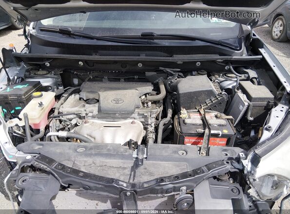 2T3BFREV1JW713728 2018 TOYOTA RAV4 Silver Rear view
