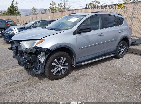 2T3BFREV1JW713728 2018 TOYOTA RAV4 Silver Front left