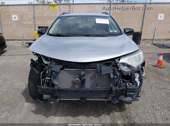 2T3BFREV1JW713728 2018 TOYOTA RAV4 Silver Rear interior view