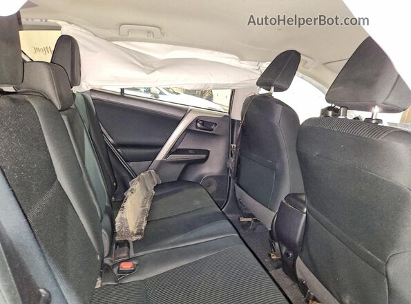 2T3BFREV7JW718450 2018 TOYOTA RAV4 Purple Rear interior view