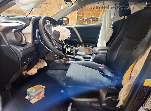 2T3BFREV7JW718450 2018 TOYOTA RAV4 Purple Front interior view