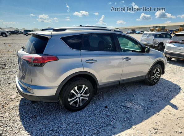 2T3BFREVXGW433282 2016 TOYOTA RAV4 Серебряный Задняя правая четверть