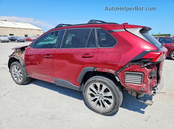 2T3C1RFV2MW121812 2021 TOYOTA RAV4 Burgundy Trasero izquierdo