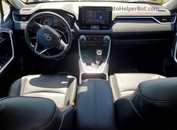 2T3C1RFV9MC168742 2021 TOYOTA RAV4 Черный Вид панели приборов