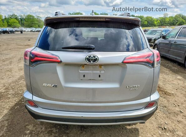 2T3DFREV7JW855669 2018 TOYOTA RAV4 Silver Vista trasera