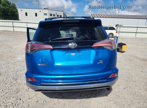 2T3JFREV9HW592873 2017 TOYOTA RAV4 Blue Вид ззаду