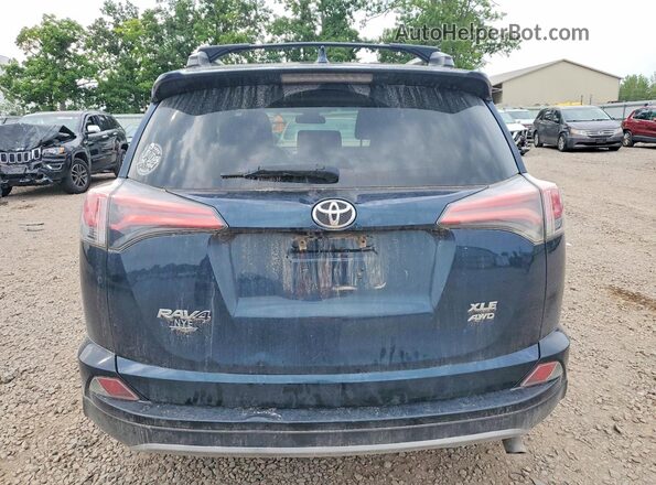 2T3RFREV3JW741089 2018 TOYOTA RAV4 Blue Rear view