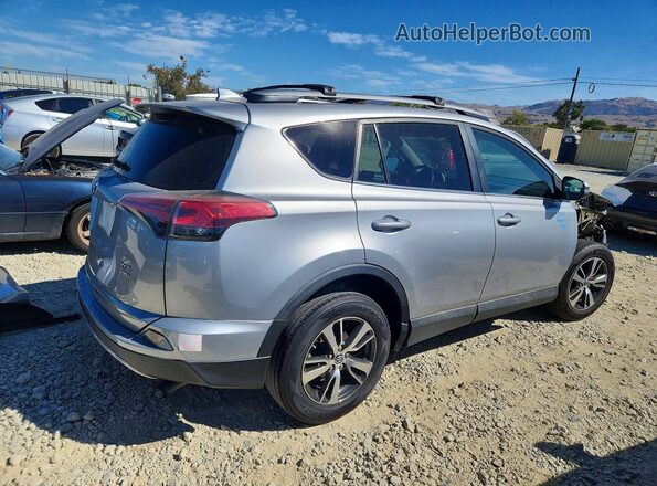 2T3RFREV4HW692060 2017 TOYOTA RAV4 Silver Հետևի աջ
