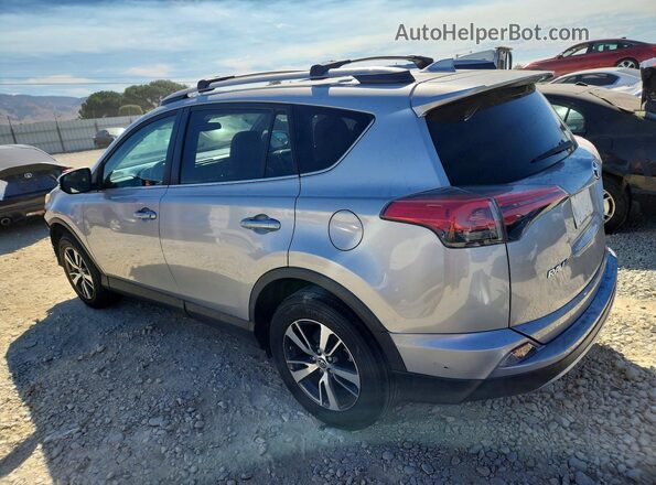 2T3RFREV4HW692060 2017 TOYOTA RAV4 Silver Հետևի ձախ