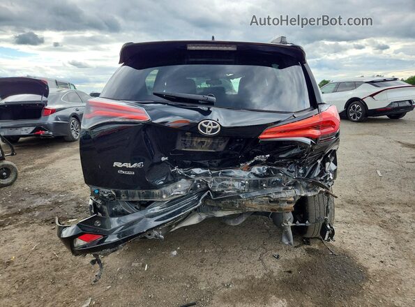 2T3RFREV8GW474055 2016 TOYOTA RAV4 Black Հետևի տեսք