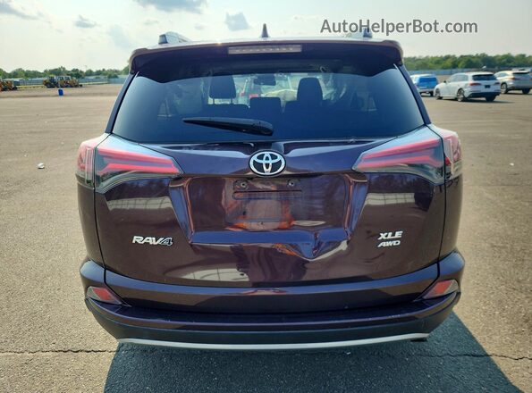 2T3RFREV8JW719332 2018 TOYOTA RAV4 Purple Вид ззаду