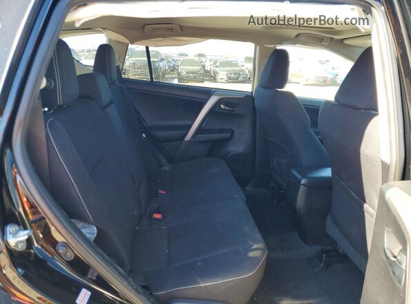 2T3RFREVXHW602507 2017 TOYOTA RAV4 Black Вид задньої частини салону