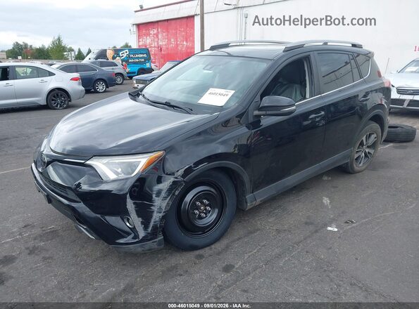 2T3RFREVXHW657801 2017 TOYOTA RAV4 Black Vista tres cuartos delantera izquierda