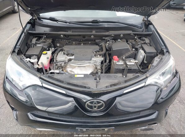 2T3RFREVXHW657801 2017 TOYOTA RAV4 Black Vista trasera