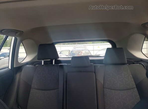 2T3RWRFV7RW250051 2024 TOYOTA RAV4 White Rear seats view