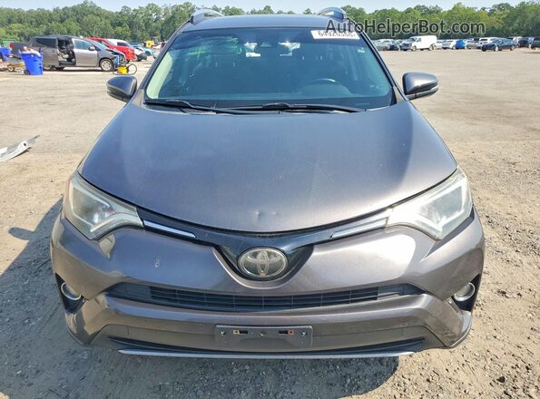 2T3WFREV1JW443854 2018 TOYOTA RAV4 Gray Вид спереду