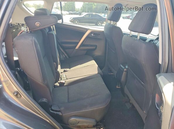 2T3WFREV1JW443854 2018 TOYOTA RAV4 Gray Вид задніх сидінь