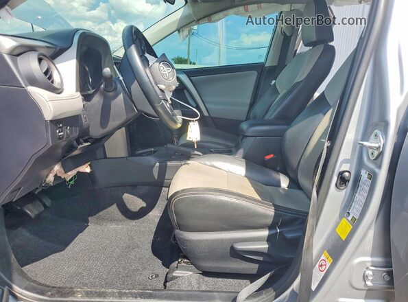 2T3WFREV3GW278673 2016 TOYOTA RAV4 Silver Widok wnętrza z przodu