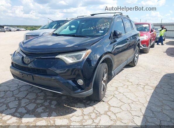 2T3WFREV5GW295989 2016 TOYOTA RAV4 Black წინა მარცხენა ხედი სამი მეოთხედიდან