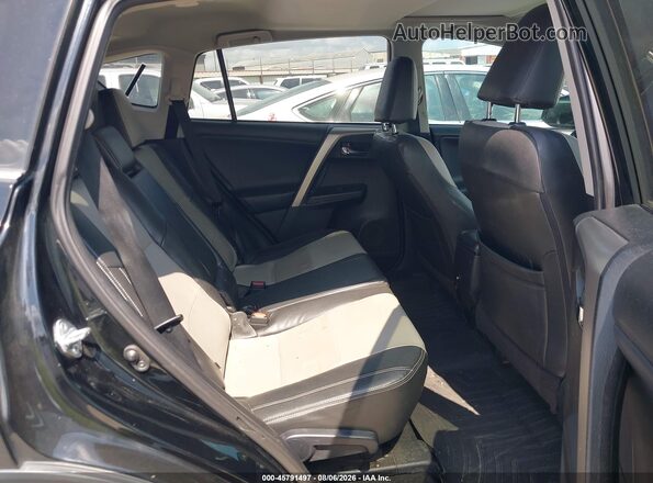 2T3WFREV5GW295989 2016 TOYOTA RAV4 Black VIN კოდის სტიკერის ხედი