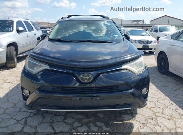 2T3WFREV5GW295989 2016 TOYOTA RAV4 Black ხელსაწყოთა პანელის ხედი