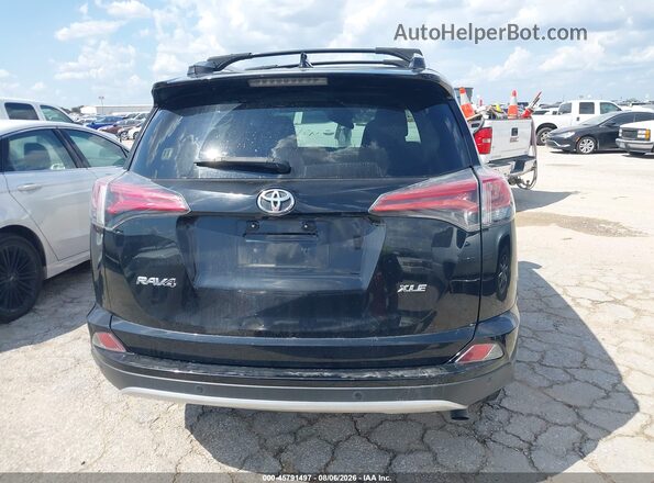 2T3WFREV5GW295989 2016 TOYOTA RAV4 Black 