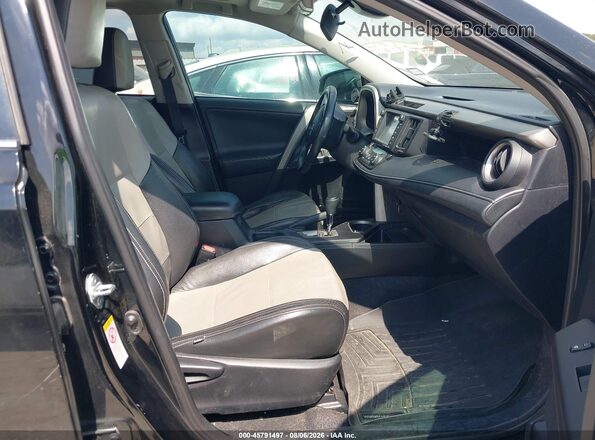 2T3WFREV5GW295989 2016 TOYOTA RAV4 Black წინა სალონის ხედი