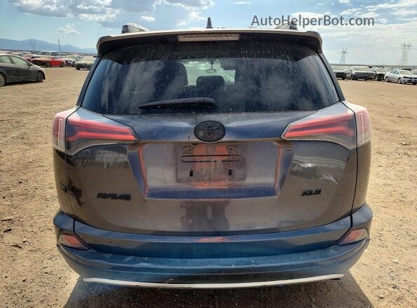 2T3WFREV9GW302071 2016 TOYOTA RAV4 Charcoal Вид ззаду
